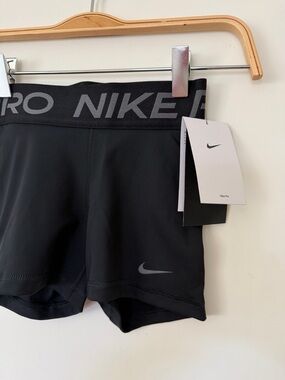 Woman’s Nike Pro Black Athletic Shorts with Grey Swoosh